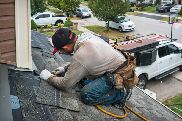 Professional Roofing technician working in Larimore, ND